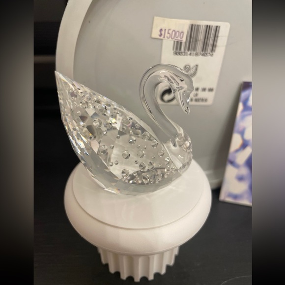 Swarovski Crystal Swan figurine with pedestal. Comes in...